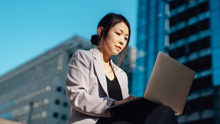 a woman working on a laptop