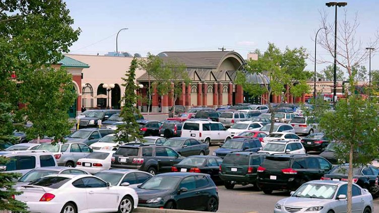 Cars parked in front of mall